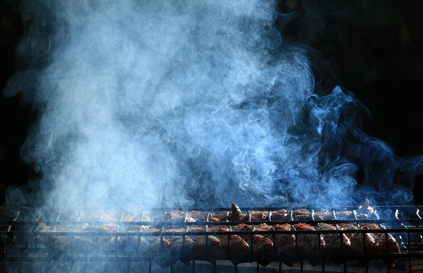 A vibrant BBQ platter featuring wild boar, kangaroo, and Aussie wagyu at Bones & Smoke in Terrigal, showcasing local meats and seasonal ingredients grilled over cherry wood. Best food in central coast